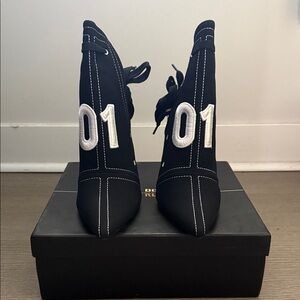 Fashion Nova Black Heeled Boots with White Accents